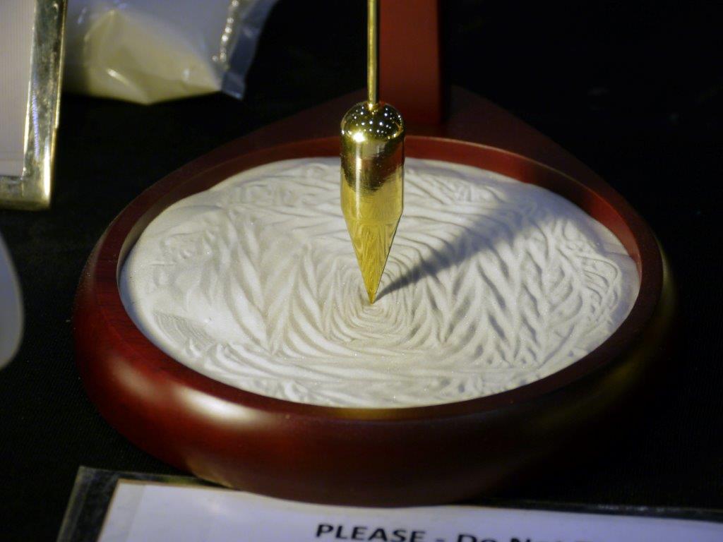 Pit and Pendulum: Zen Designs in Sand