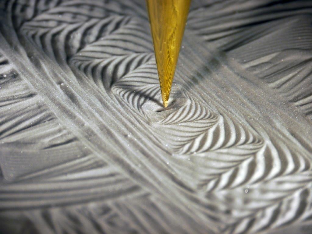 Pit and Pendulum: Zen Designs in Sand
