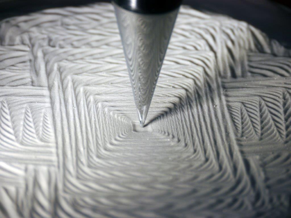 Pit and Pendulum: Zen Designs in Sand